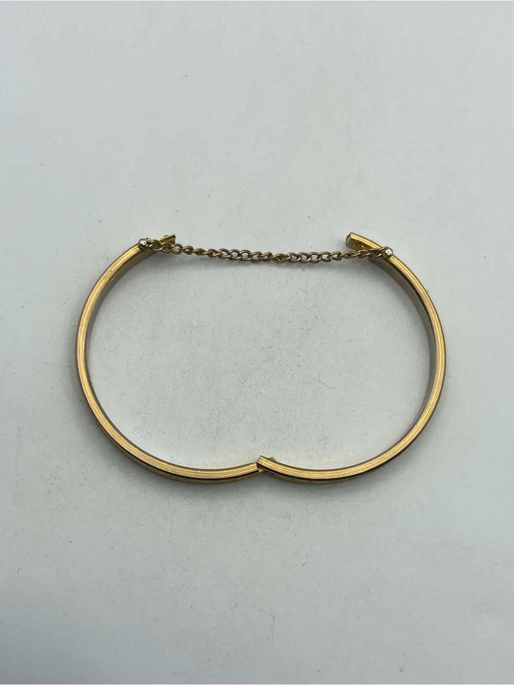 Etched design gold tone small child sized bangle bracelet vintage